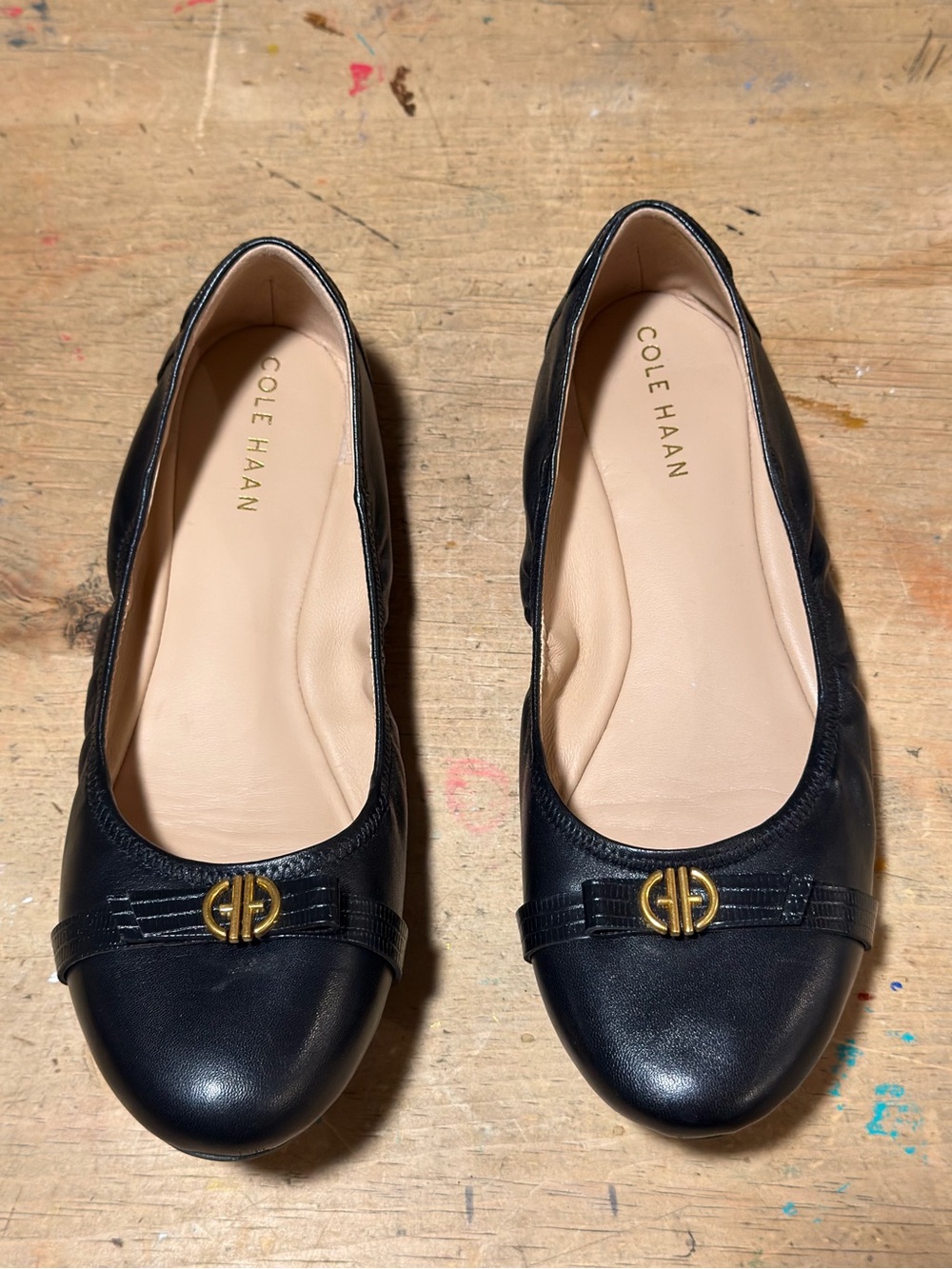 Cole Haan Black Leather Women's Slip-On Ballet Flats with Gold Logo